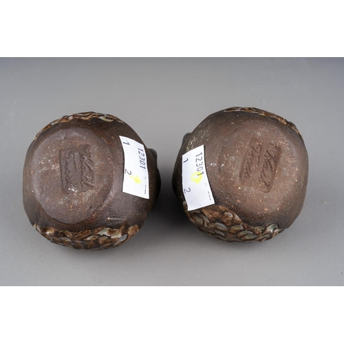 614 - A pair of Mid-Century Swedish pottery birds in blue and brown with feather detailing designed by Ben... 