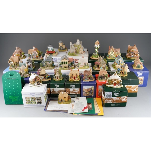 617 - Twenty six small Lilliput Lane models, the majority boxed, comprising two Christmas baubles The Donk... 