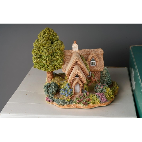 618 - A boxed Lilliput Lane limited edition 'Reflections of Jade', no.2365/ 3950, chips to pagoda, with ce... 