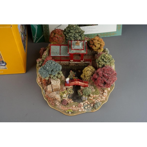 618 - A boxed Lilliput Lane limited edition 'Reflections of Jade', no.2365/ 3950, chips to pagoda, with ce... 