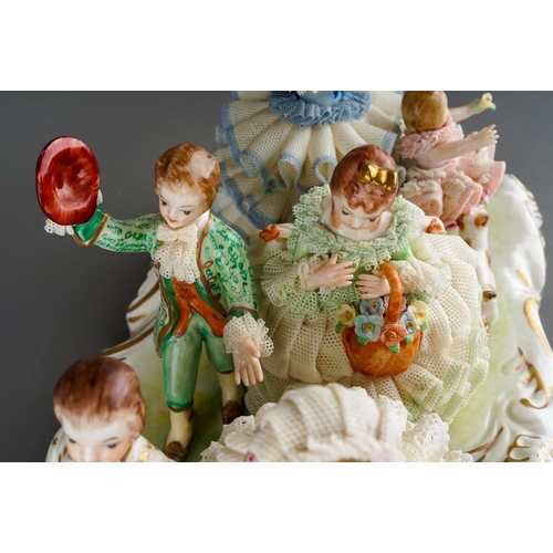 An Irish Dresden porcelain figure group titled 'Wedding Game