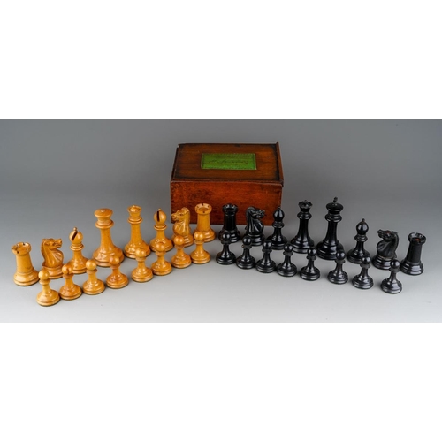 Antique boxed Jaques Staunton pattern boxwood and ebony chess set. Between 1862-1880 in date. The Kings stand 9cm tall. Some damage to the box, and the white king has lost his cross.