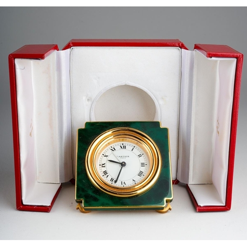 770 - Cartier Paris: a late 20th Century brass and green enamel travel alarm clock, the white enamel dial ... 