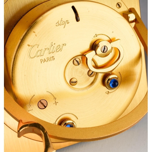 770 - Cartier Paris: a late 20th Century brass and green enamel travel alarm clock, the white enamel dial ... 