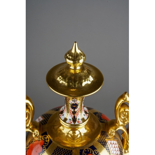 615A - A Royal Crown Derby Imari 1128 large two handled urn, ovoid shape on plinth base, approx 42cm high