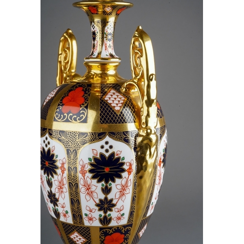 615A - A Royal Crown Derby Imari 1128 large two handled urn, ovoid shape on plinth base, approx 42cm high