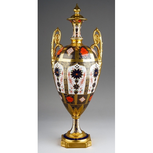 615A - A Royal Crown Derby Imari 1128 large two handled urn, ovoid shape on plinth base, approx 42cm high