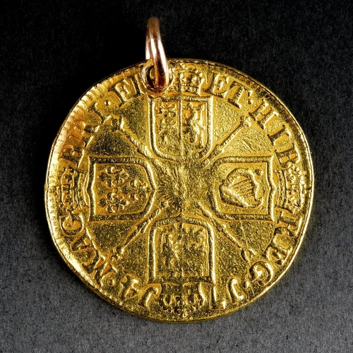 Queen Anne 1714 gold full guinea coin with a 9 ct gold loop, gross weight 8.2 grams.