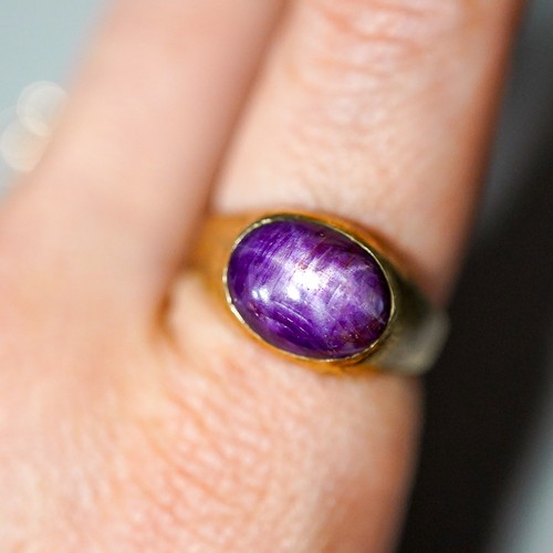 1 - Yellow metal ( marked 9k) ring set with a purple stone, UK size Q 1/2, gross weight approx. 5.9g