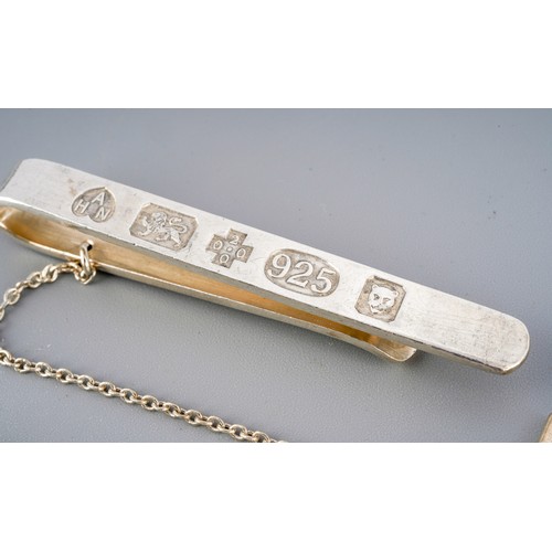 7 - A pair of Givenchy cufflinks formed as knots, two further silver cufflinks and two silver tie pins. ... 