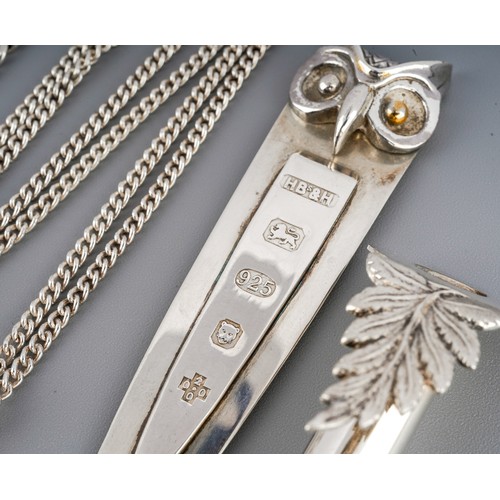 9 - Collection of silver and white metal jewellery to include own book mark, posy holder, chains and pen... 