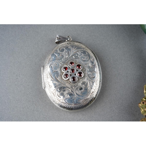 27 - Silver pendant locket, white metal ( marked 925) bangle and  a Tibetan style necklace, weighable sil... 