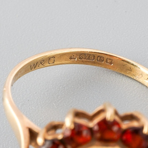30 - A 9ct gold garnet cluster ring. Hallmarked 9ct gold, approx ring size M, approx gross weight 2.8 gra... 