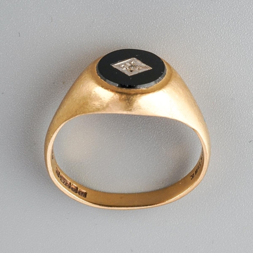 34 - 9ct gold and onyx men's ring set with inclusion set diamond to centre, UK size S ( slightly misshape... 
