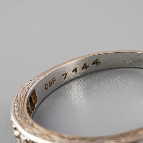 49 - An 18ct white gold diamond and sapphire eternity ring. Set with single-cut diamonds, grain set and c... 