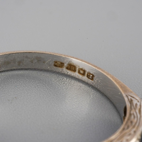 49 - An 18ct white gold diamond and sapphire eternity ring. Set with single-cut diamonds, grain set and c... 