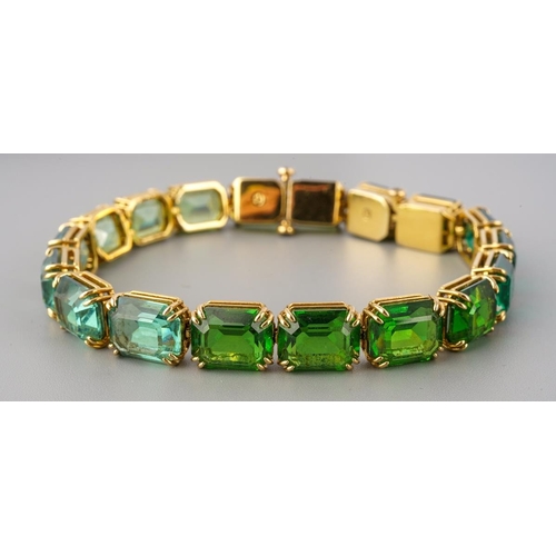 53 - Swarovski Millenia tennis crystal bracelet 18k gold plated set with green stones