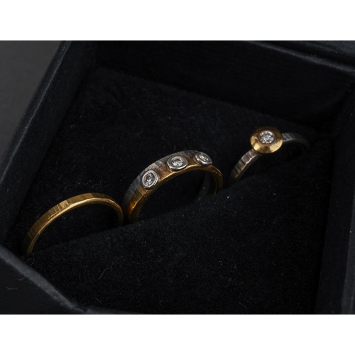 56 - Diana Porter silver bangle and three rings. Two diamond set hallmarked silver rings together with an... 