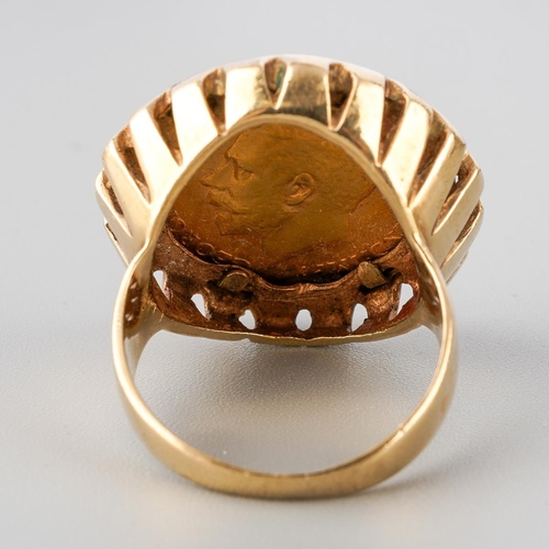 58 - 1911 half sovereign ring, mounted in 9 ct gold, gross weight approx. 9.9g, UK size P 1/2