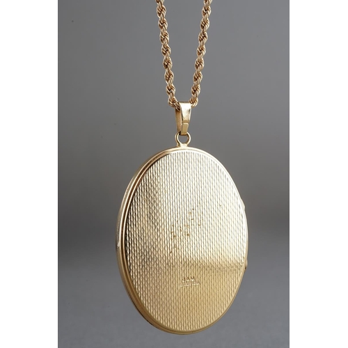 60 - Large 9ct gold pendant locket, engine turned to back and etched to front together with a 9 ct gold r... 