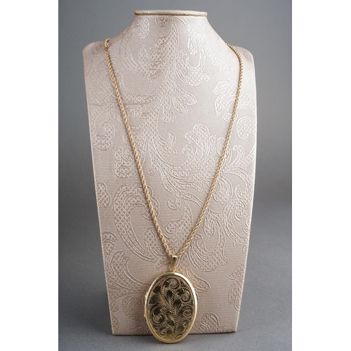 60 - Large 9ct gold pendant locket, engine turned to back and etched to front together with a 9 ct gold r... 