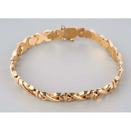 128 - A yellow metal ( marked 9 ct) bracelet, 19 cm long, approx. gross weight 10.2g