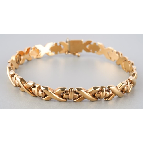128 - A yellow metal ( marked 9 ct) bracelet, 19 cm long, approx. gross weight 10.2g
