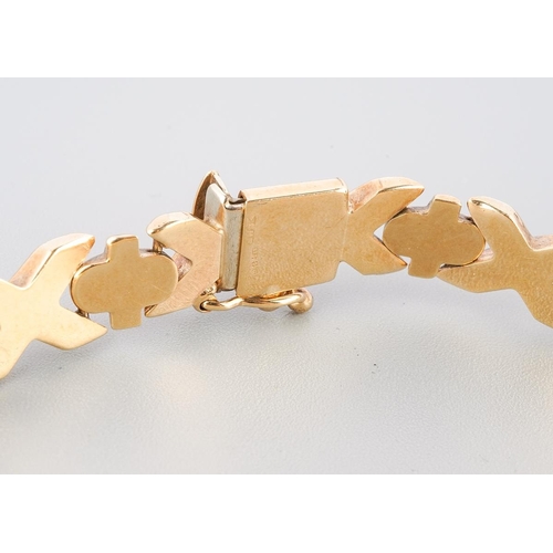 128 - A yellow metal ( marked 9 ct) bracelet, 19 cm long, approx. gross weight 10.2g