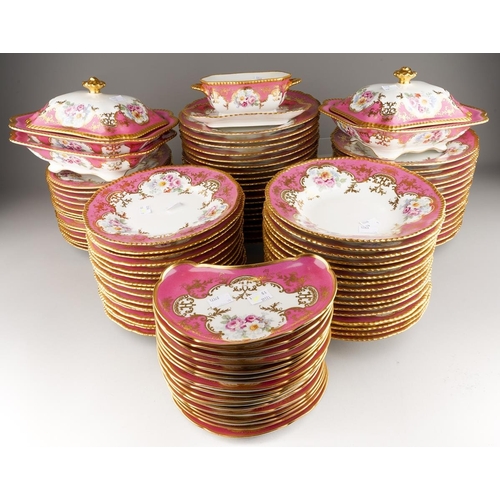 An extensive Limoges (D&C/L Bernaudaud & Co) part dinner service, scalloped gilt edges with Pompadour pink borders decorated with floral bouquets, gild scrolls and foliage, plain white reserves, all stamped to include: 34 dinner plates, 29 lunch/dessert plates, 16 soup bowls, 17 crescent shaped sides plates, two tureens and covers, one tureen base and a sauce tureen [Q]