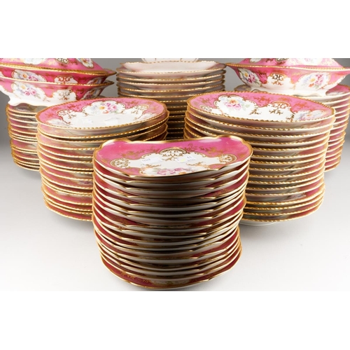 908 - An extensive Limoges (D&C/L Bernaudaud & Co) part dinner service, scalloped gilt edges with Pompadou... 