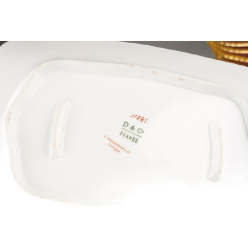 908 - An extensive Limoges (D&C/L Bernaudaud & Co) part dinner service, scalloped gilt edges with Pompadou... 