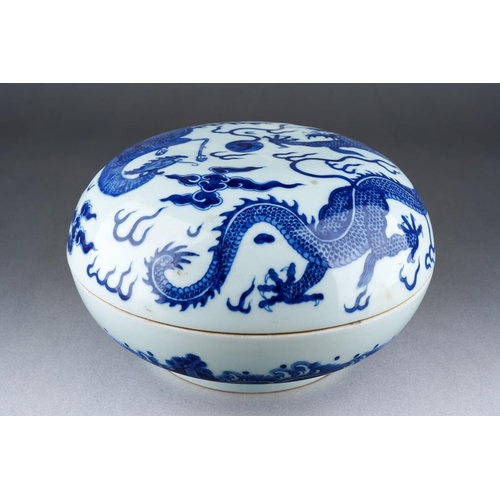 A Chinese blue and white large box and cover, the cover decorated with a Dragon and Rooster amongst clouds, the base with water., six character marks within concentric rings to base [1]