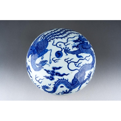707 - A Chinese blue and white large box and cover, the cover decorated with a Dragon and Rooster amongst ... 