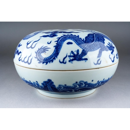 707 - A Chinese blue and white large box and cover, the cover decorated with a Dragon and Rooster amongst ... 