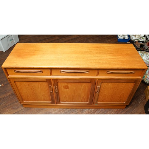 1025 - A teak G Plan Fresco sideboard. fitted with three frieze drawers and three cupboards, each cupboard ... 