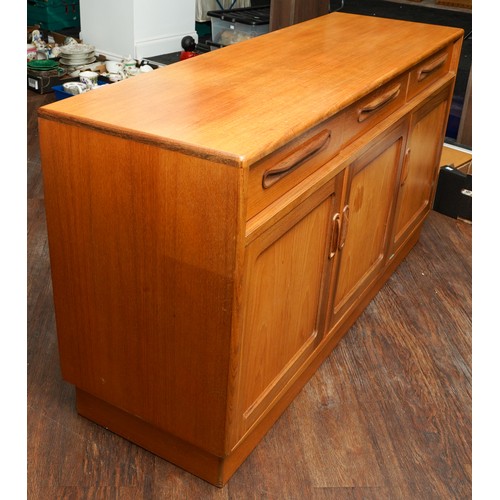1025 - A teak G Plan Fresco sideboard. fitted with three frieze drawers and three cupboards, each cupboard ... 