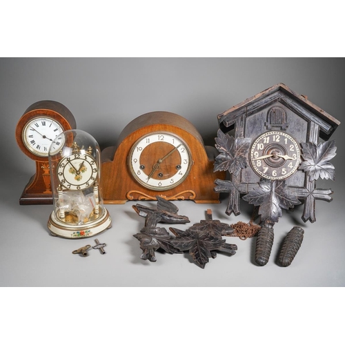 63 - Four various 20th century wall and mantel clocks, comprising an Edwardian balloon shaped mahogany an... 