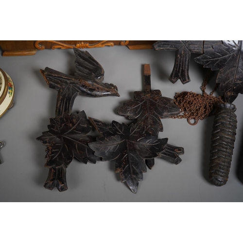 63 - Four various 20th century wall and mantel clocks, comprising an Edwardian balloon shaped mahogany an... 