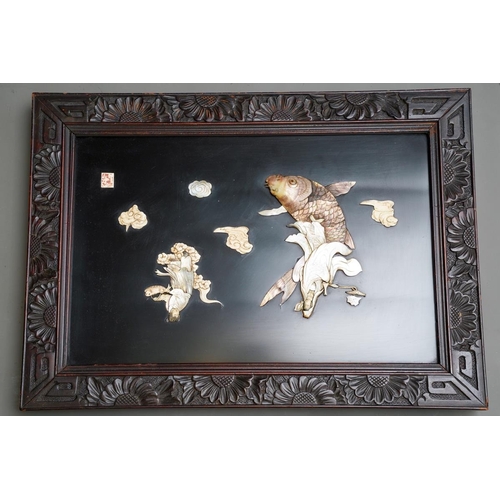 66 - Two early 20th century Japanese shibayama panels in foliate carved frames, one depicting two male fi... 