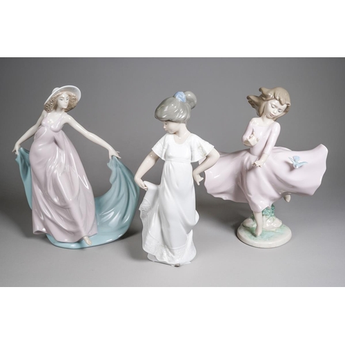 80 - Two Lladro figures of girls in pink dresses, comprising 6412 - Joy of life and 5663 - Spring Dance, ... 
