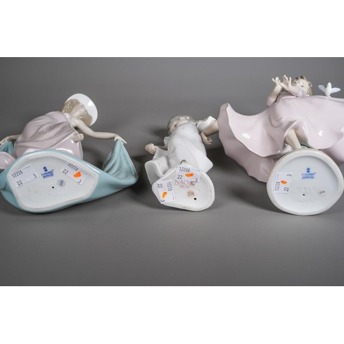 80 - Two Lladro figures of girls in pink dresses, comprising 6412 - Joy of life and 5663 - Spring Dance, ... 