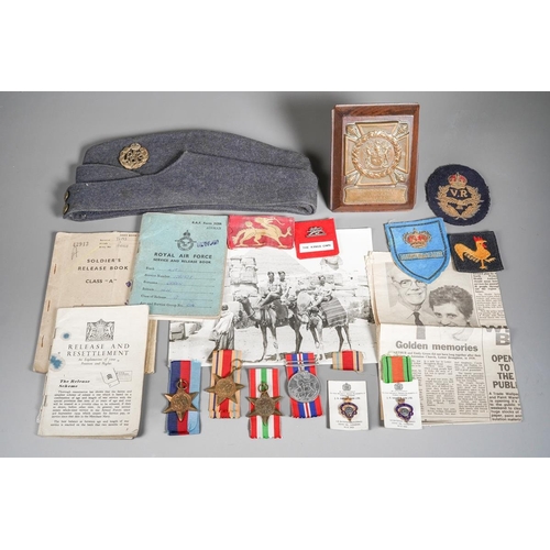 86 - A collection of WWII militaria, including a South African Memorial plaque for 68344 A/B. W. A. Palme... 