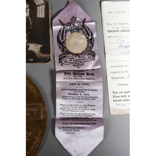 87 - A World War I death penny/plaque awarded to John William Booth, comes with a silk In Loving Memory b... 