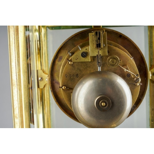 88 - A 19th century French four-glass mantel clock, the white enamel dial with black Roman numerals, twin... 