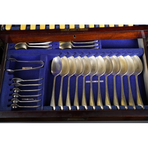 91 - An early 20th century mahogany cased canteen of Viners silver plated Old English pattern cutlery for... 