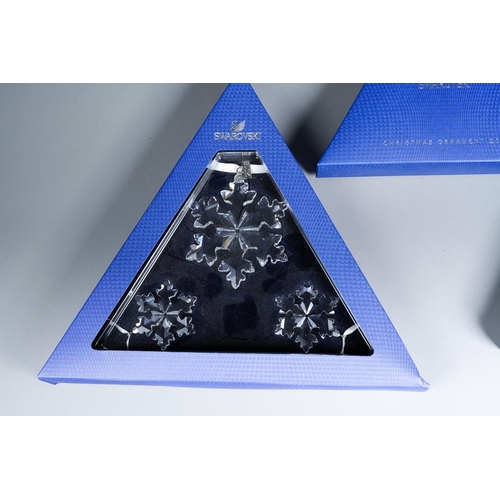 384 - Two boxed Swarovski Christmas bauble sets, comprising 2015 Ornament and 2016 set of three stars [2]