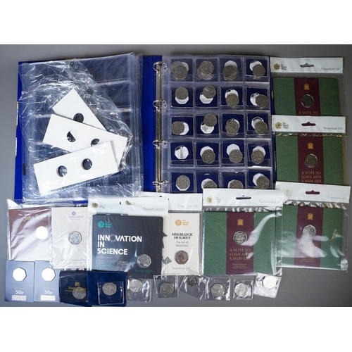 389 - A Coin Checker folder containing approximately seventy legal tender 50p coins, mostly picture backs,... 