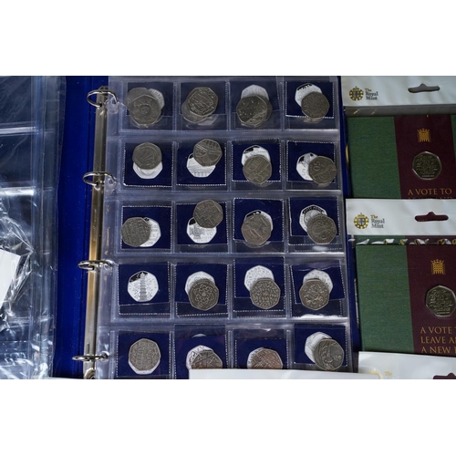 389 - A Coin Checker folder containing approximately seventy legal tender 50p coins, mostly picture backs,... 