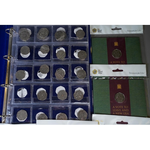 389 - A Coin Checker folder containing approximately seventy legal tender 50p coins, mostly picture backs,... 
