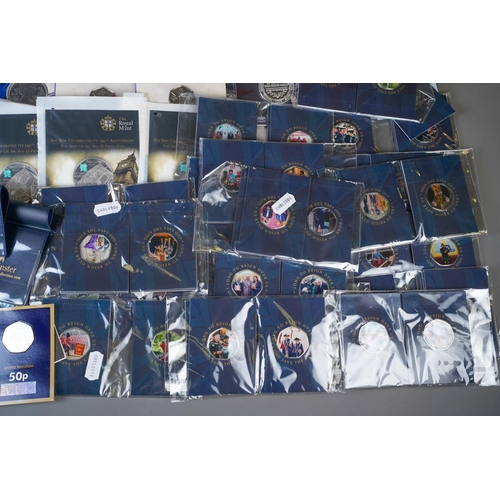 390 - A collection of Royalty related commemorative UK 50p coins, including some dual plated and commemora... 